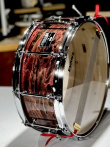 15"x 6½" Steam-bent solid maple snare drum with high-gloss polyester clear coat over a custom hand painted finish and triple-flanged hoops