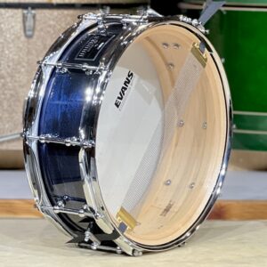 Steam Bent Maple Snare Drum. Custom solid maple snare drum in a dark blue hand painted with a high-gloss polyester clear coat and triple-flanged hoops